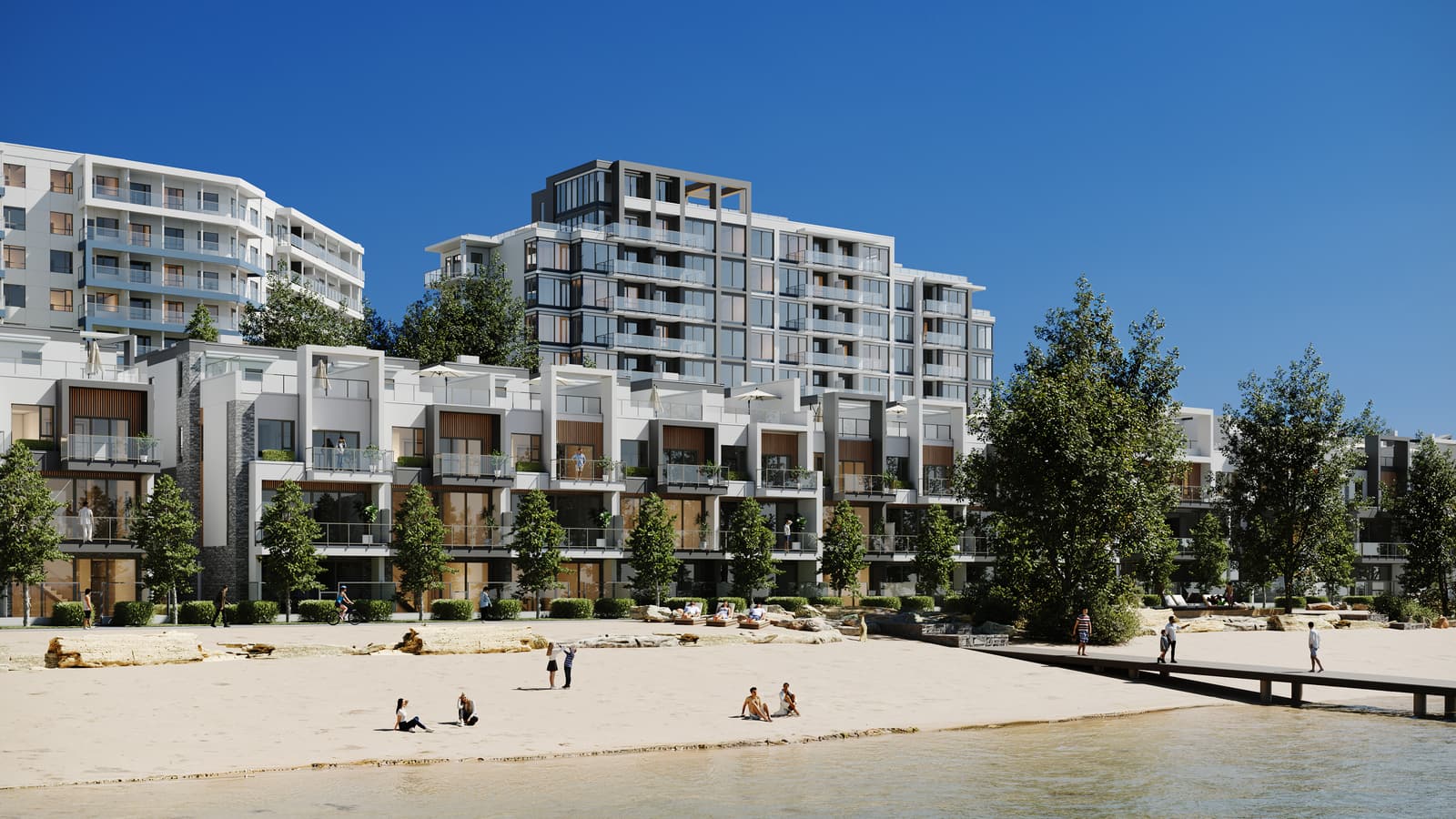Sunbathers on the white sand beach in front of the waterfront villas and the Waterfront Tower, with a dock reaching into the lake