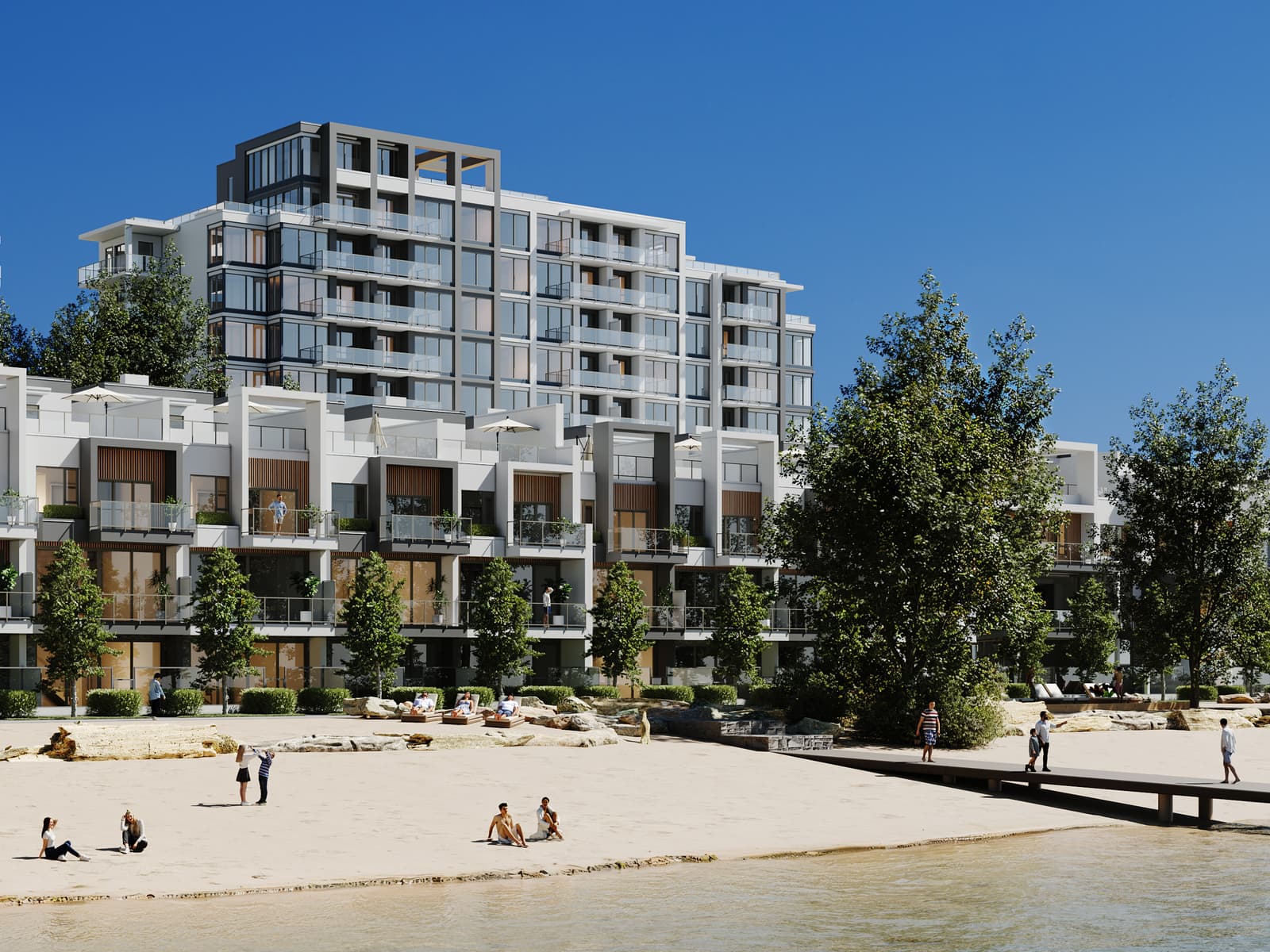 Sunbathers on the white sand beach in front of the waterfront villas and the Waterfront Tower, a dock reaching into the lake