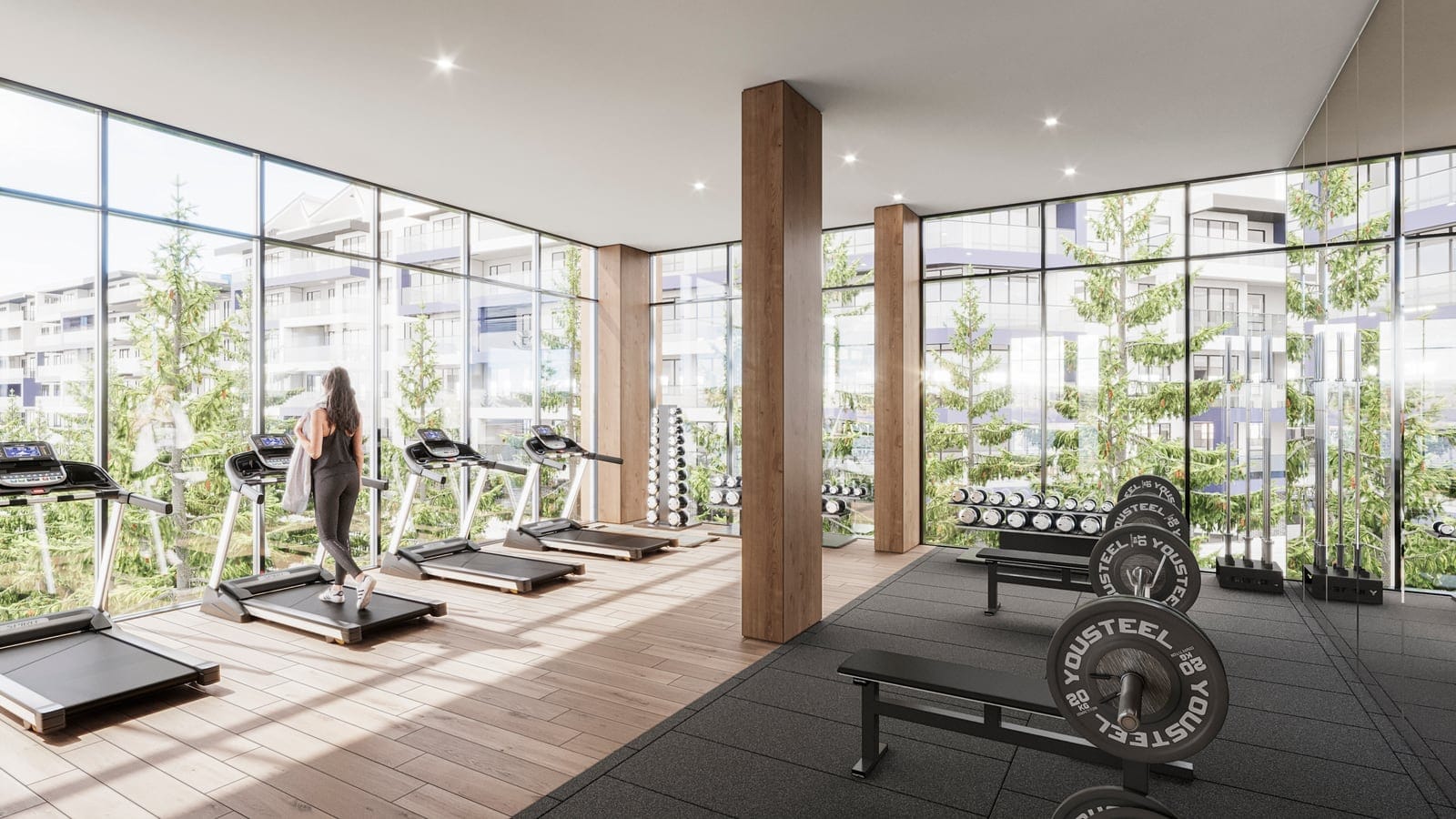 Fitness centre with treadmills and free weights behind floor-to-ceiling windows