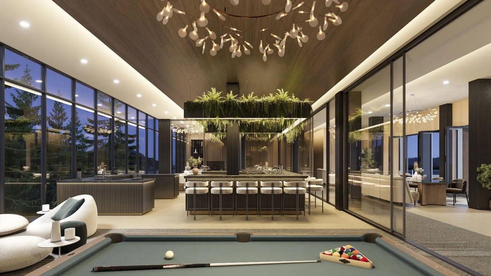 Residents’ lounge with a bar, a pool table and lake views through floor-to-ceiling glass