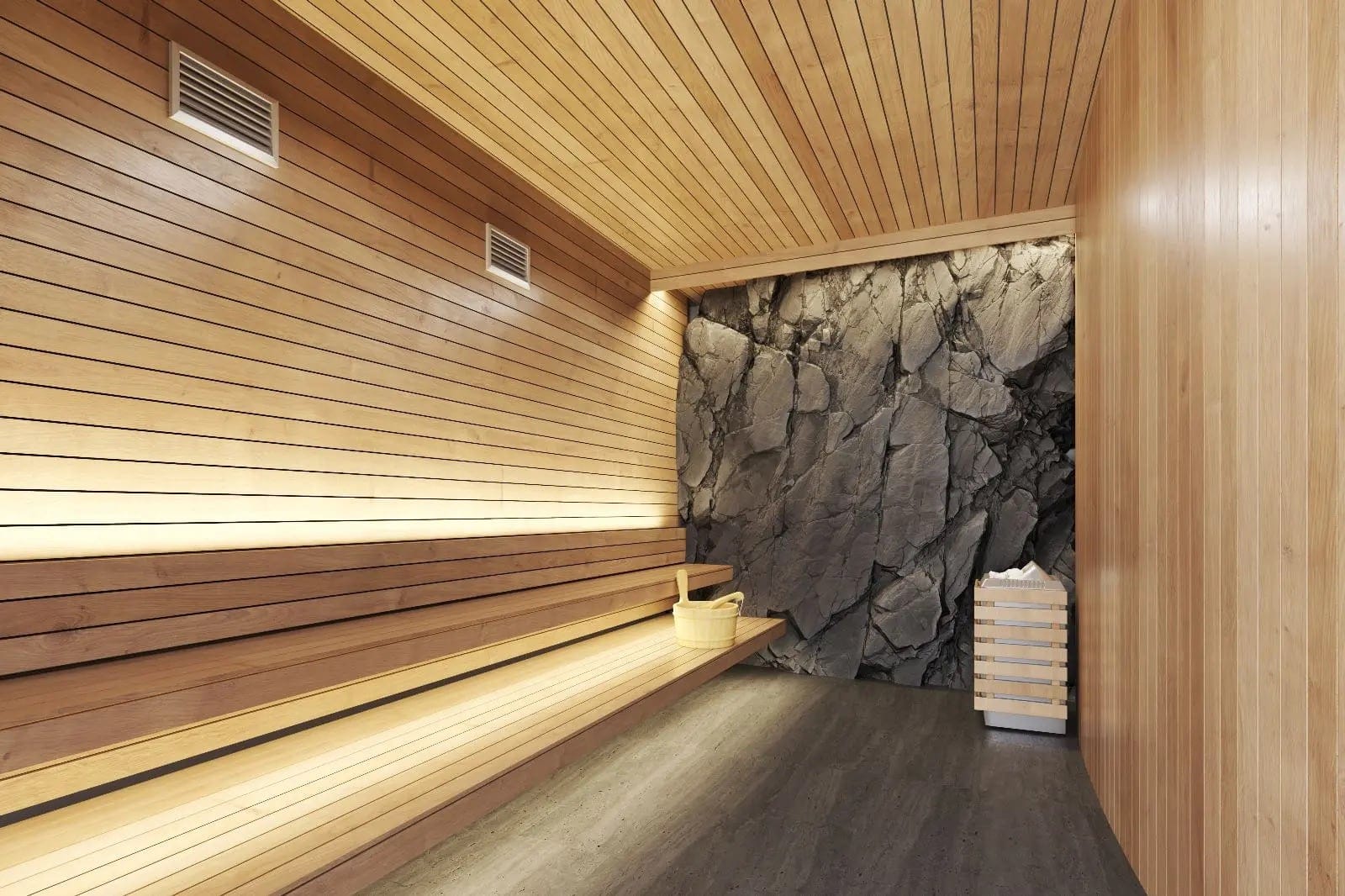 Cedar-lined sauna with a stone feature wall