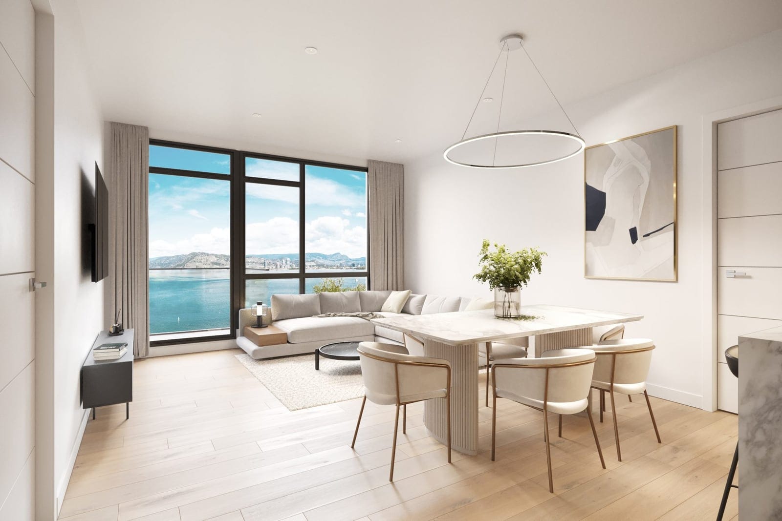 Waterfront Tower living and dining room in the light colour scheme with lake views