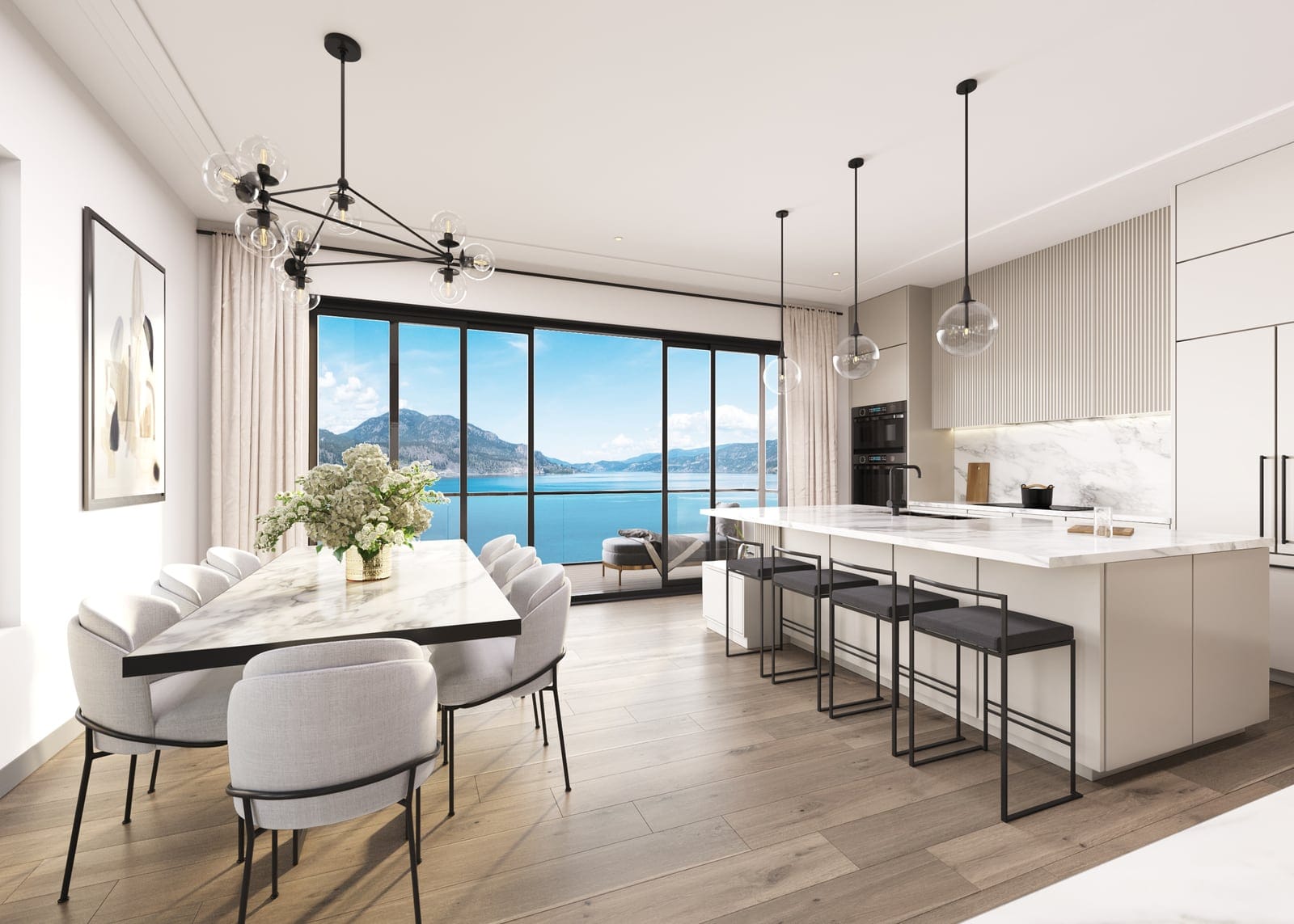 Villa kitchen and dining area in the light colour scheme facing Okanagan Lake