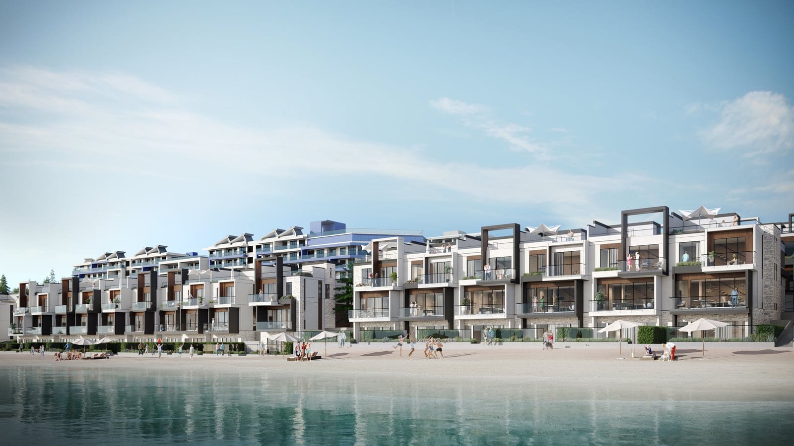 Waterfront villas along the white sand beach on a sunny day, seen from the lake